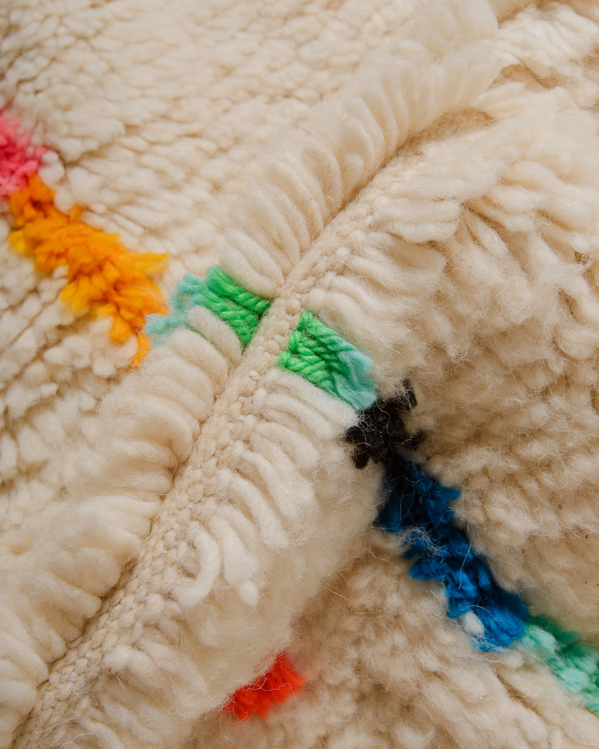 Close-up of Azilal rug showing the fluffy wool and the spacing between the rows.